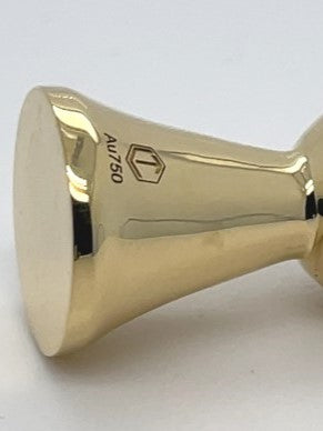 18k gold game piece