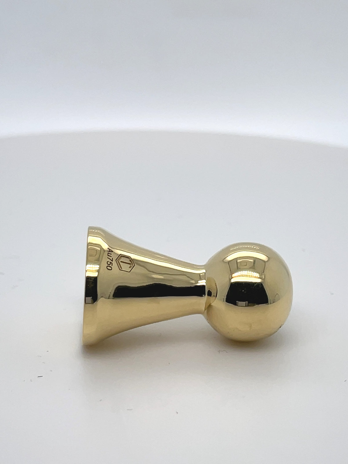 18k gold game piece