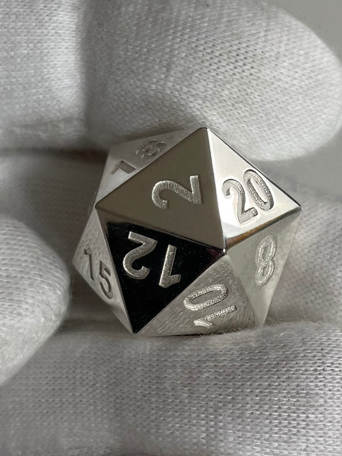 D20 Silver Dice polished in hand - D20 Silberwürfel in der Hand