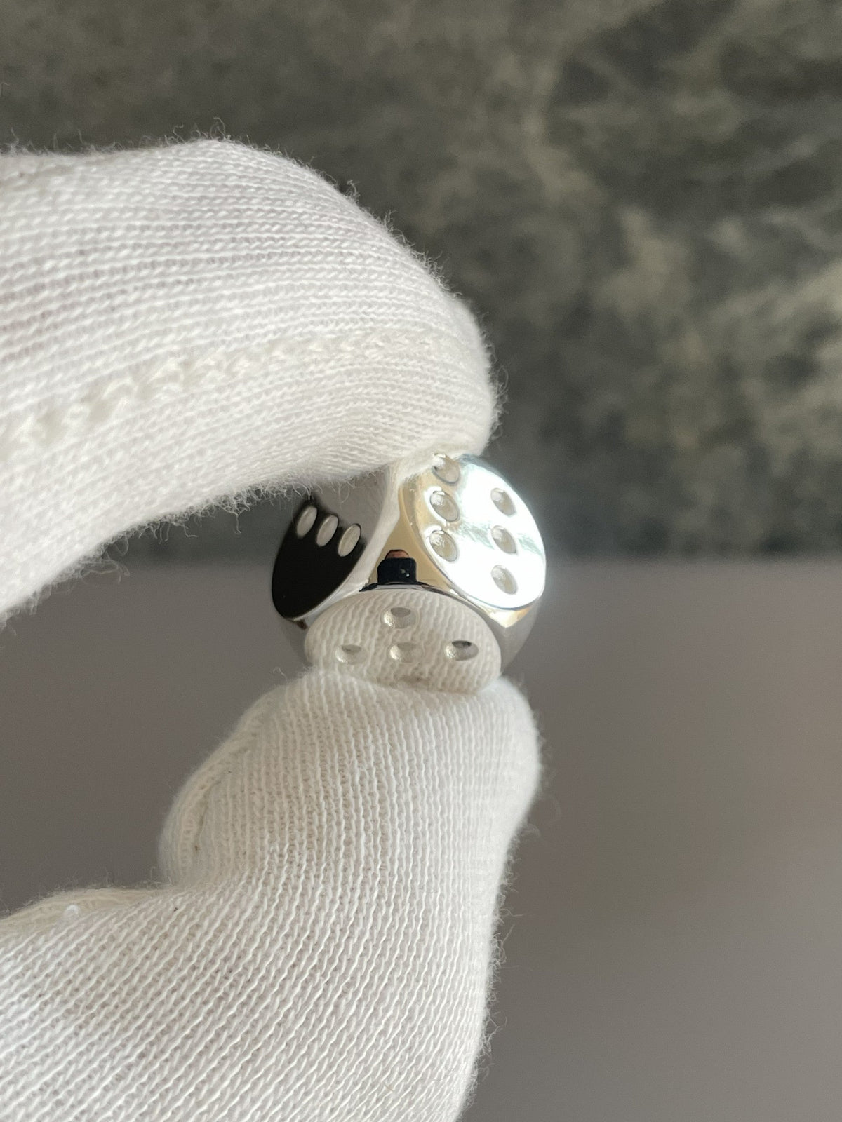 Dice Silver in hand no 6 5 3