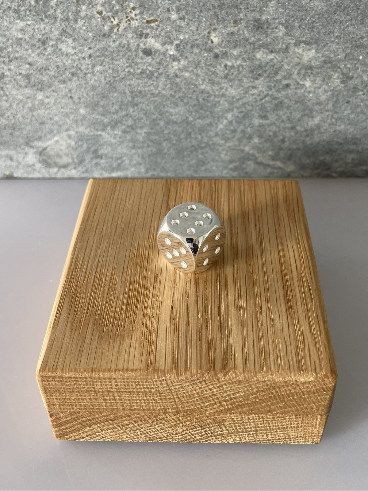 Dice Silver polished on oak case no6