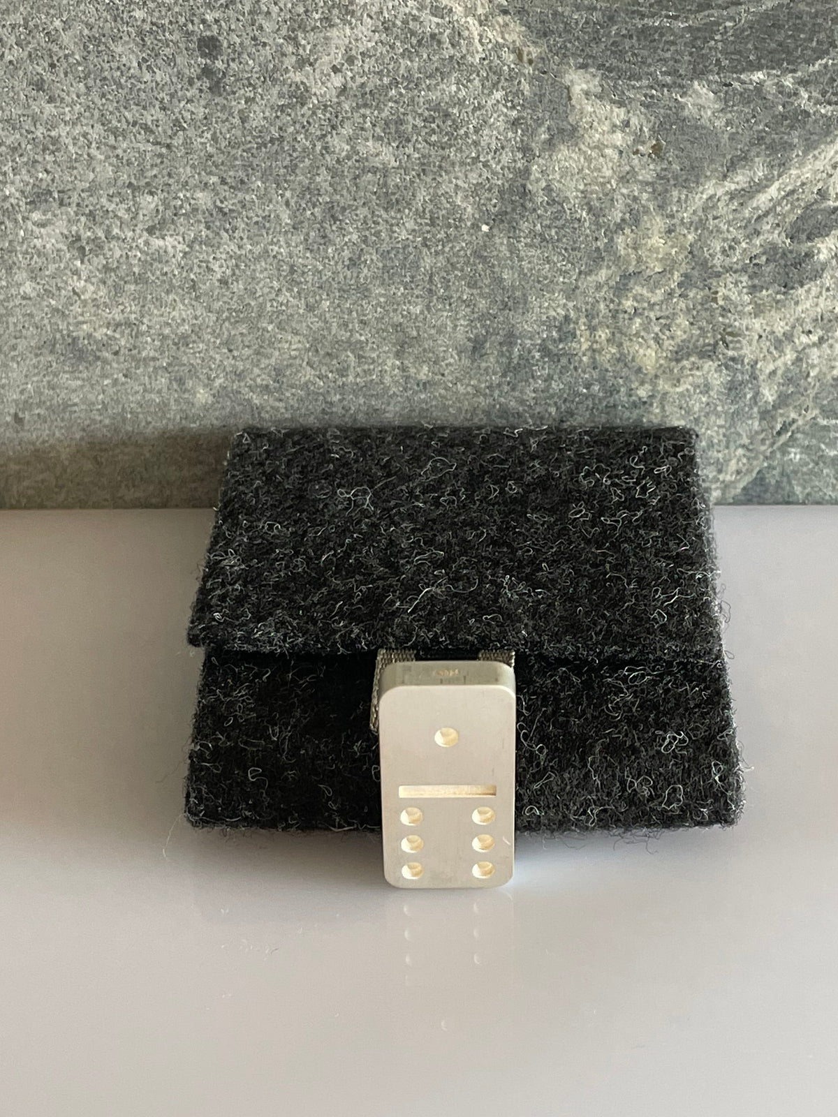 Domino piece Silver on case