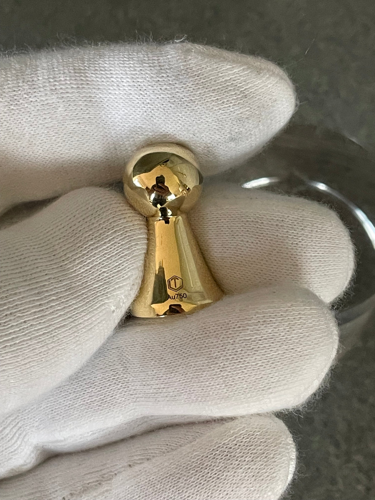 18k gold game piece