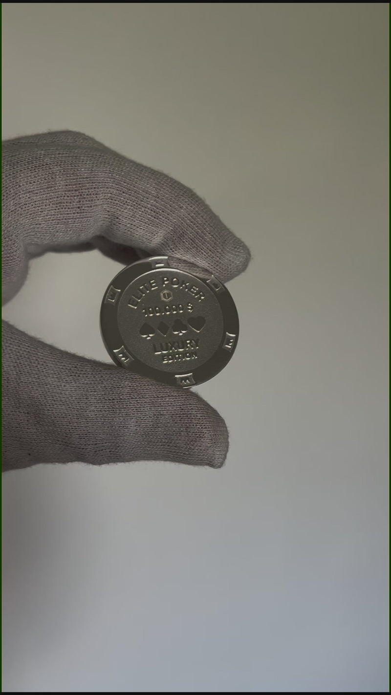Poker Chip silver presented in hand