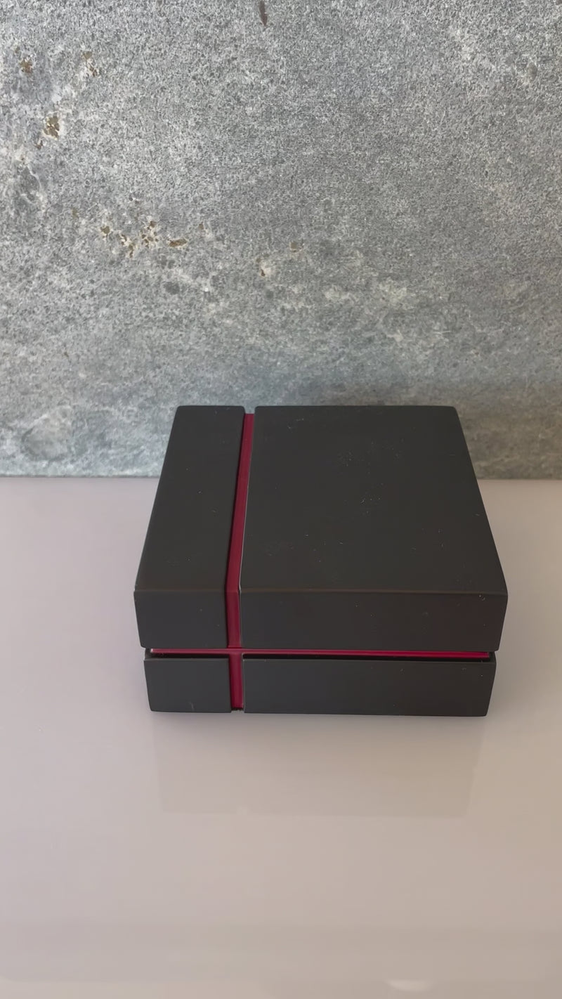 18k Gold Dice presented in black case