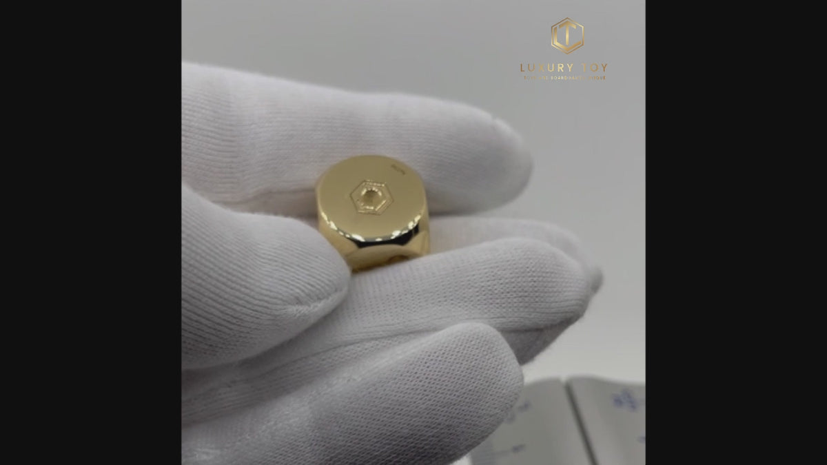 Gold Dice presented in Hand 