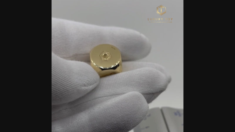 Gold Dice presented in Hand 